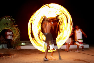 The nightly street fire dance in front of the Mancora bars ights up the night sky.